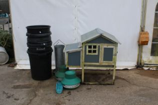 A chicken coop and accessories.