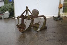 A Ferguson two furrow plough. Complete with points and discs etc.