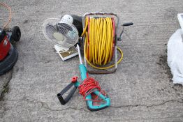 An assortment of gardening items. Including a strimmer, hose reel, rubber matting and a desk fan.