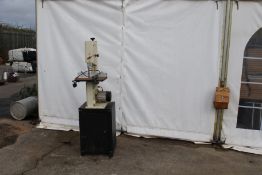 An Axminster White band saw (in working order) on a metal cabinet stand. Model AWSBS2. 240v.