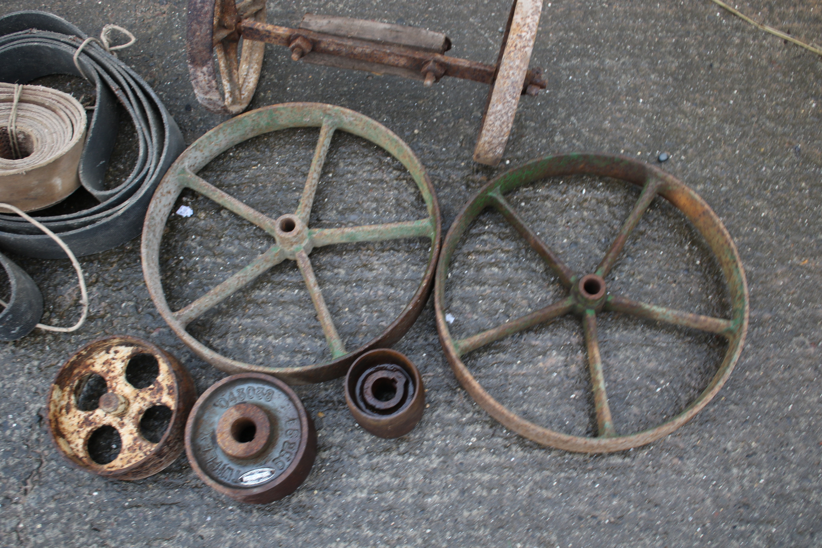 A collection of cast iron and stationary engine wheels. - Image 2 of 5