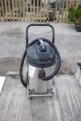 A numatic industrial wet and dry vacuum cleaner on a trolley. Model WVD 750-2. 110v.