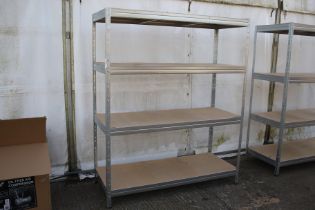 An aluminium shelving rack. Comprising four shelves complete with shelving. H180 x W150cm x D60cm.