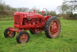 An International Harvester McCormick Farmall M tractor.