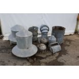 Eleven galvanised items. Including chicken feeders, buckets, bins, etc.