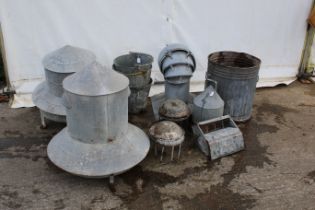 Eleven galvanised items. Including chicken feeders, buckets, bins, etc.