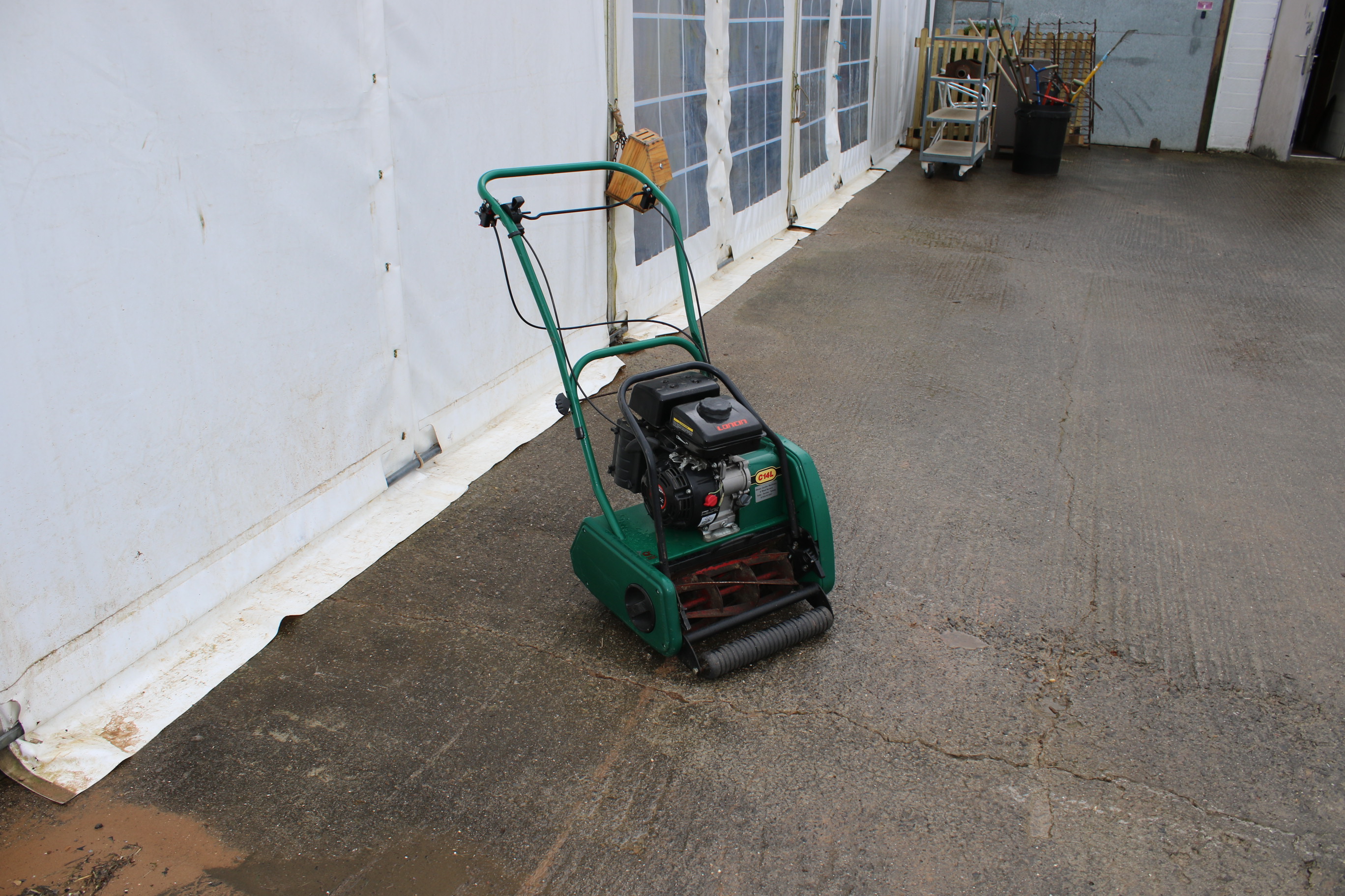 A Loncin petrol push along lawn mower. Complete with rear roller, in green. - Image 2 of 3