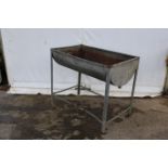 A galvanised metal wash stand and sink. H89cm x W103cm x D63cm.