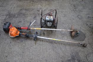 Two garden petrol strimmers and a generator.