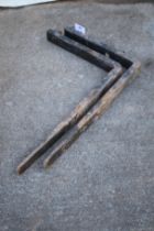 A set of fork lift pallet forks.