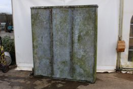 A free standing galvanised tank. With riveted sides, not watertight, H173cm x W153cm x D40cm.