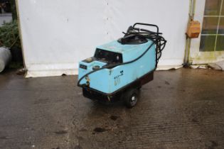 A Kew diesel powered steam cleaner. On wheels, in blue, complete with lance.