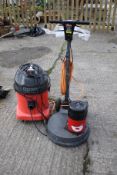 Two items of industrial cleaning equipment.