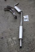 MG sports car exhaust tail pipe and manifolds.