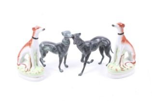 Two pairs of greyhound ornamental figures.