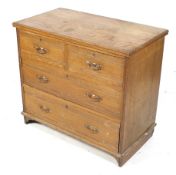 A 20th century oak chest of drawers.