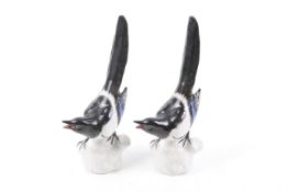 Two Russian ceramic models of magpies.