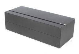 A contemporary Spectral TV stand entertainment cabinet. Matt black finish, drop down front.