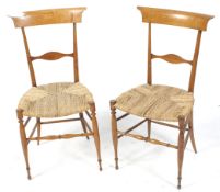A pair of 19th century wooden chairs.