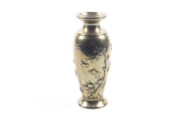 An early 20th century Japanese small inlaid brass vase.