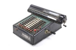 A vintage Monroe mechanical calculator.