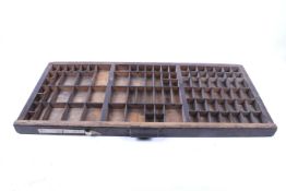 An antique wooden printers block tray. With twin metal handles, 82.