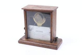 Scientific lab instrument: a vintage wood cased ammeter.