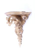 A contemporary Rococo style carved gilt wood wall bracket.