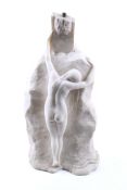 A contemporary carved white marble lamp base.