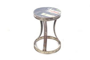 A handmade vintage industrial style riveted metal stool /table.