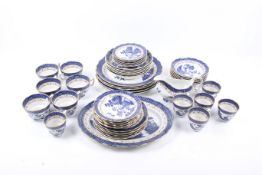 A collection of Booths 'Real Old Willow' pattern dinner service pieces.