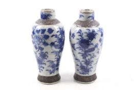 A pair of 20th century Chinese blue and white vases.