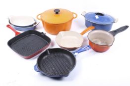 Eight pieces of Le Creuset cookware. Comprising two lidded tureens.