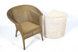 A Lloyd Loom style wicker chair and laundry basket.