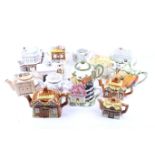 A collection of novelty ceramic teapots.