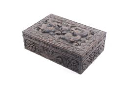 A 20th century Chinese carved hardwood box full of buttons.
