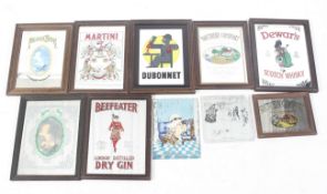 Nine vintage pub advertising mirrors.