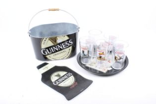 An assortment of vintage Guinness collectables.