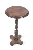 A Victorian mahogany pedestal table.
