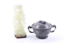 A Chinese pewter and hardstone food warmer and a green hardstone carving of a lady.