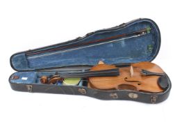 A vintage violin, bow and case. Unbranded.