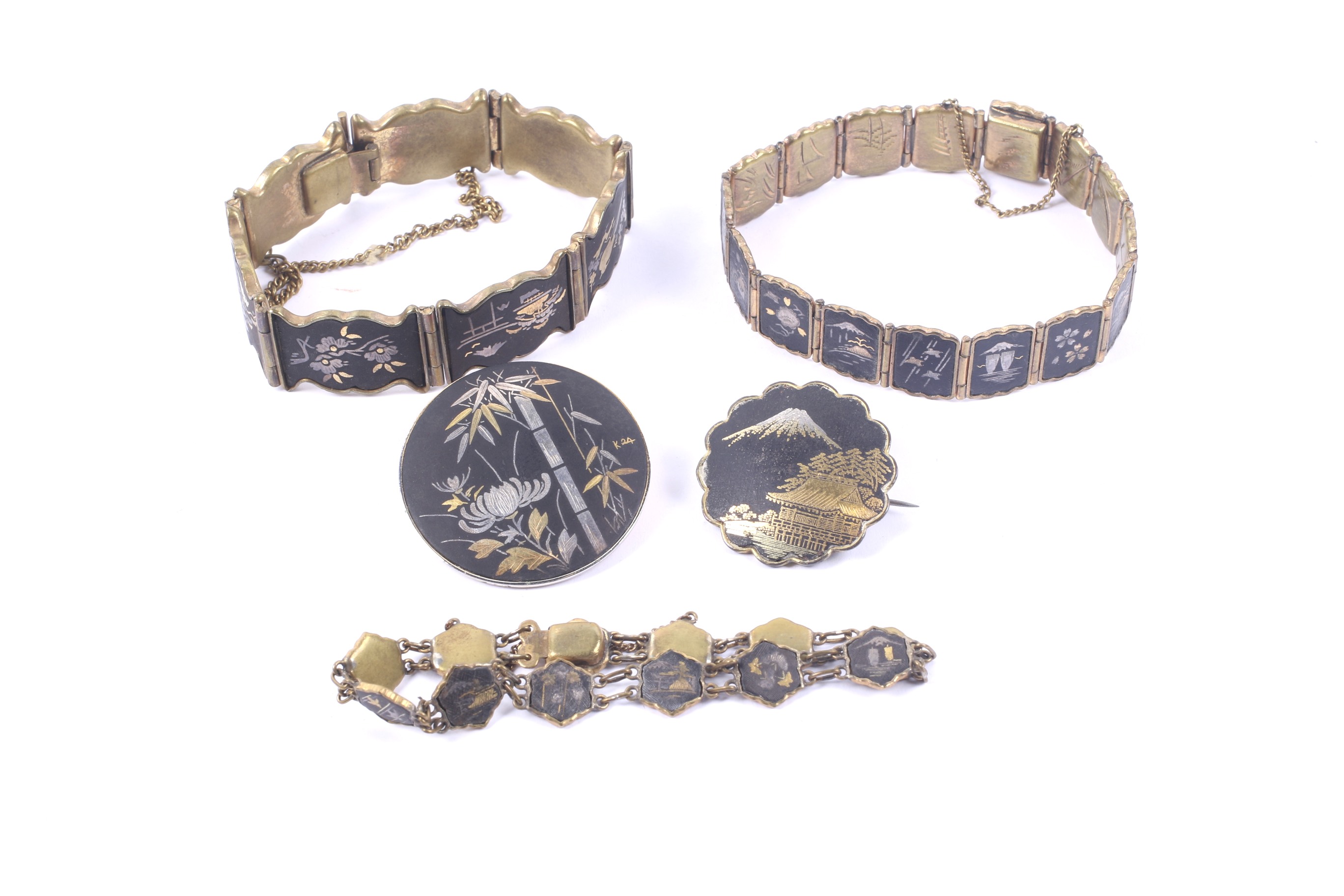 A group of Japanese mixed metal inlaid komai technique damascene jewellery.
