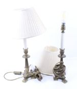 A pair of brass table lamps.
