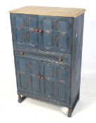 A later painted mid-century drinks cabinet.