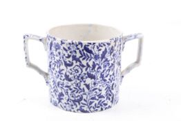A 19th century ceramic two handled 'Quart' mug. Decorated with blue flowers on a white ground, H11.
