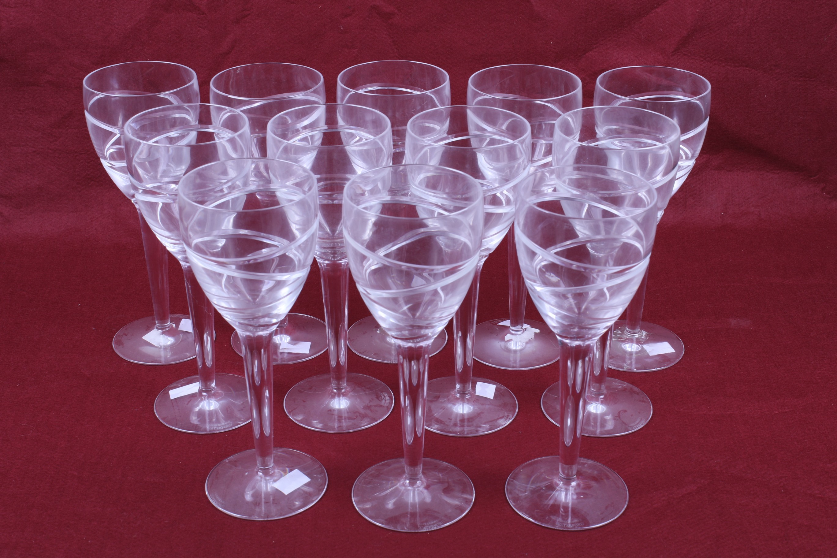A set of twelve Jasper Conran Waterford Crystal Aura Swirl Design wine glasses.