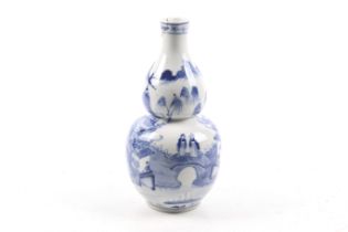 A Chinese blue and white gourd shaped vase.