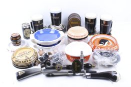 A collection of Guinness related promotional items.