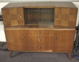 A circa 1950s 'Beautility' veneered sideboard.