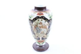 A Victorian milk glass vase.